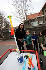Children build a rocket using the Brunel Badge Loan Box equipment