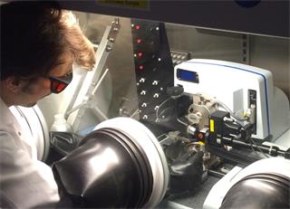 Dr Collin Becker using a combined Raman AFM system